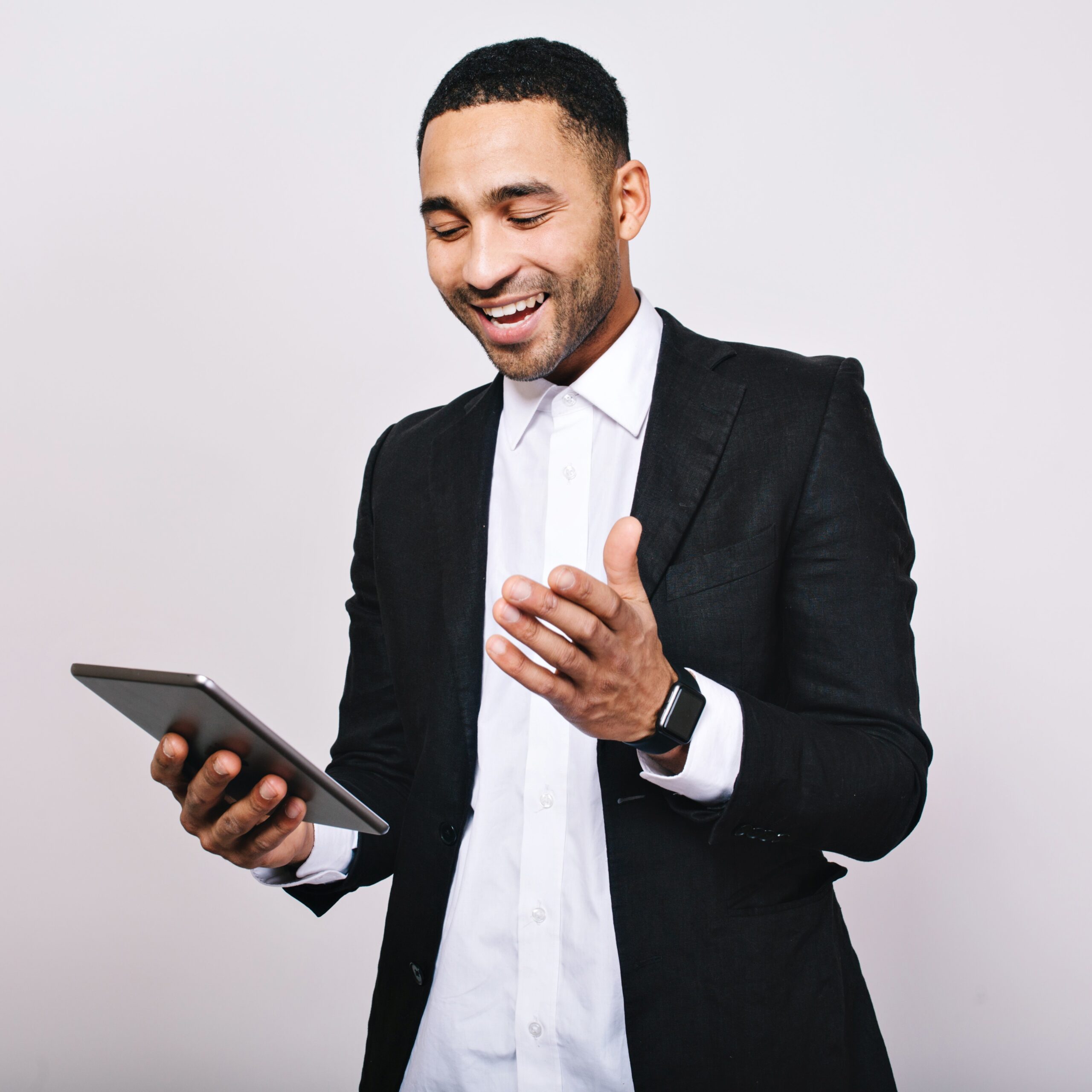 successful young man white shirt black jacket smiling tablet hands leadership great career manager cheerful mood office work modern technology smiling